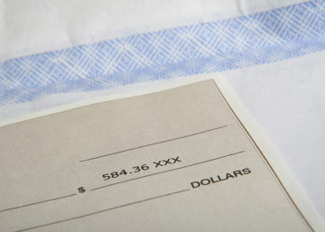 closeup of the money line on a check